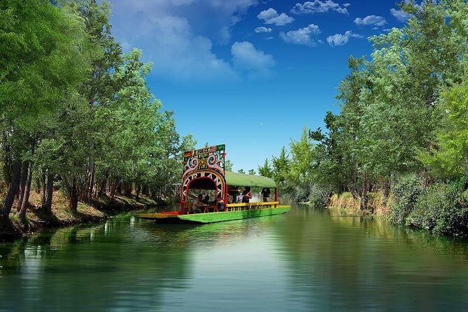 2-Day Guadalupe Shrine, Teotihuacan Pyramids and Xochimilco - Xochimilco by Aztec boat: the world heritage experience with real crowds