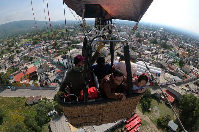 Balloon flight through Teotihuacan + Transportation CDMX + Pyramids - The landing moment: certificate, toast, and that sense of completion
