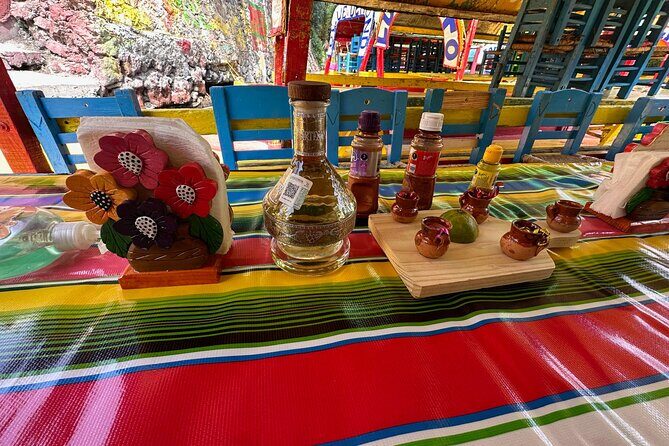 Boat Tour in Mexico City and Mezcal Fiesta with Food and ∞Drinks - Floating Gardens Stop: Xochimilco’s Water World in Real Time