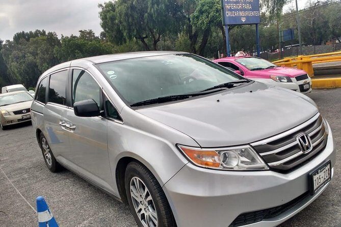 CDMX Transportation. Airport - Round trip. - Private CDMX airport pickup with a name sign