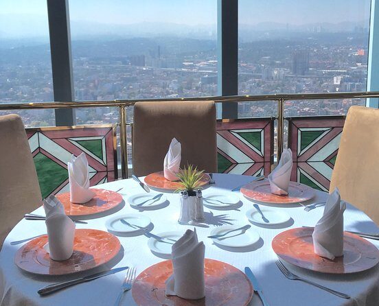 Dinner at the Revolving Bellini Restaurant in Mexico City - How the evening flows: pickup, quick stops, and a set start time