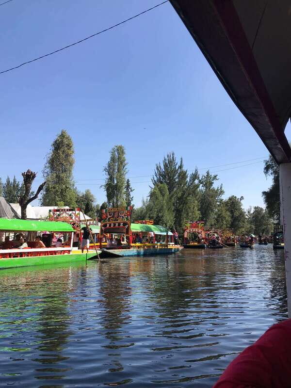 "Floating Party in Xochimilco: Canals, Tequila, and Tradition" - The boat ride basics: drinks, mixers, and staying comfortable