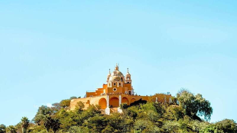 From Puebla: Cholula Pyramid and Churches all included - San Francisco Acatepec: Talavera tiles and church details you can’t fake