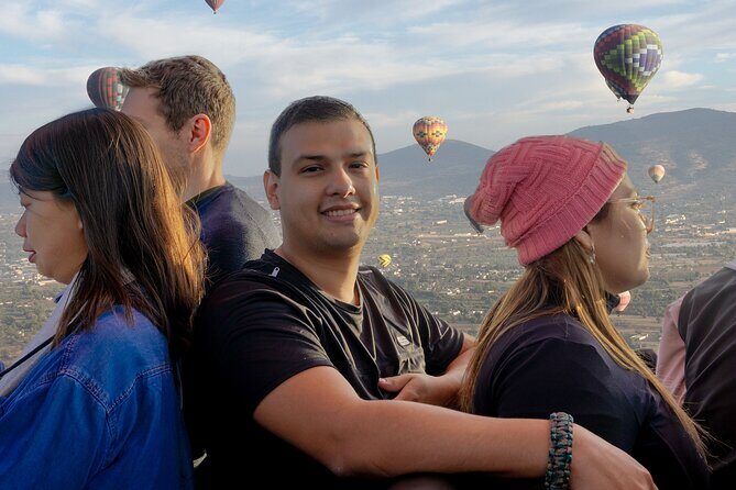 Hot Air Balloon Rides in Teotihuacan with Breakfast - Toast, souvenirs, and the landing zone follow-your-pilot moment