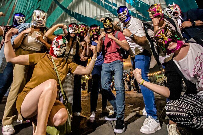 Lucha Libre Experience with Tequila, Walking Tour & Arena Show - Historic center walk: murals, memorabilia shops, and street-food choices