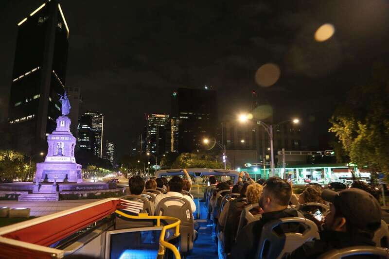 Mexico City: Night City Tour in a Double Decker Bus - Audio guide reality: languages, headphones, and seat tips