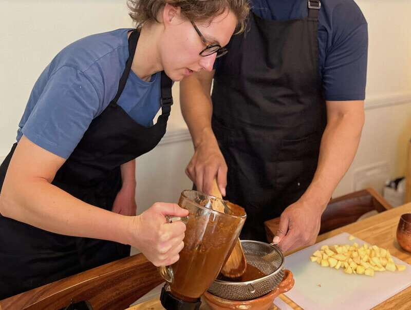Muchos moles: Multi-variety mole cooking class and feast - The meal finish: locally made dinnerware, drinks, and a shared table