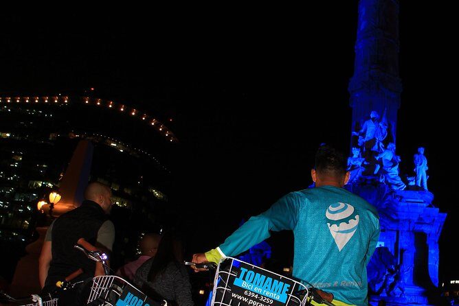 Neon Bike Party - Private Bike Tour - Stop 2: Bellas Artes—photos and stories in the golden hour to night shift