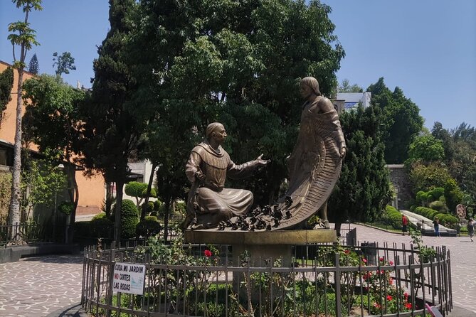 Private Tour Basilica of Guadalupe with Transportation - Capilla del Pocito and Tepeyac hill: prayer time, holy water well, and candle moments