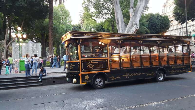Puebla: Cholula Magical Town Tour by Double-Decker Bus - Passing local landmarks on the way back to the center