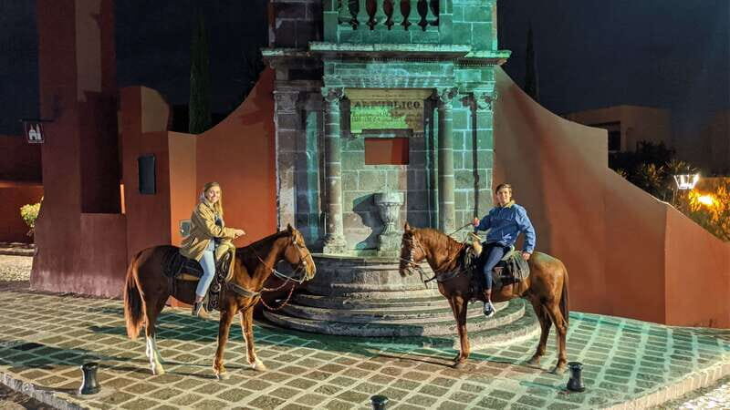 San Miguel: Romantic Horseback Riding at Sunset - Nightfall in Colonia San Antonio: colorful homes and a church stop