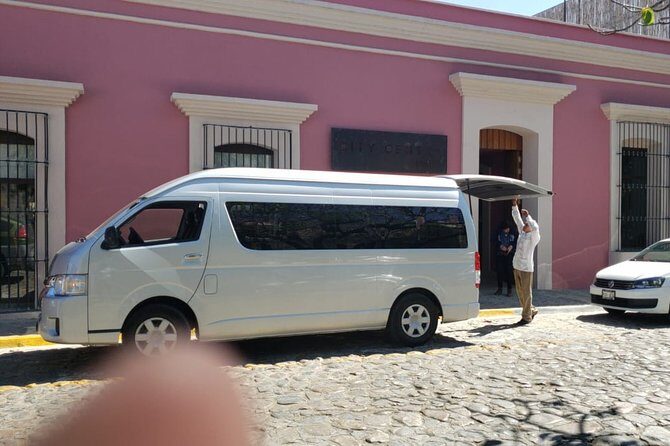 Shuttle from downtown Oaxaca city to Oaxaca airport. One way - Comfort You Actually Feel: AC, Safety, and Luggage Moments