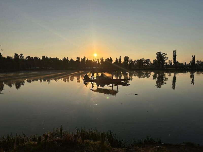 Sunrise in Xochimilco - Trajinera on twilight canals with coffee in your hands
