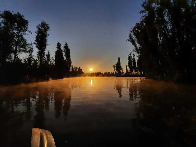 Sunrise in Xochimilco - Tlilac and the Tonatiuh moment behind the volcanoes