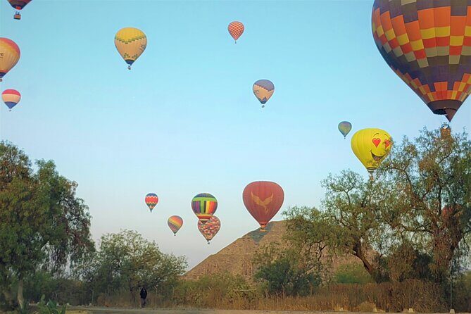 Tour to Teotihuacan from CDMX with entrances included - Templo de Quetzalcóatl: stone carving and art at the top