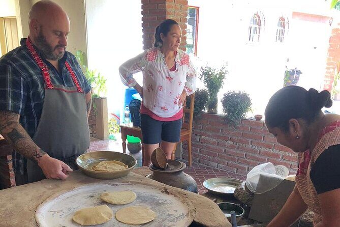 Traditional Cooking Class with Minerva Lopez - Minerva Lopez’s outdoor kitchen and wood-stove welcome