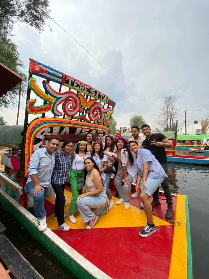 Xochimilco: Food and Trajinera Ride with Local Women - The trajinera ride: canals, mariachi energy, and family time