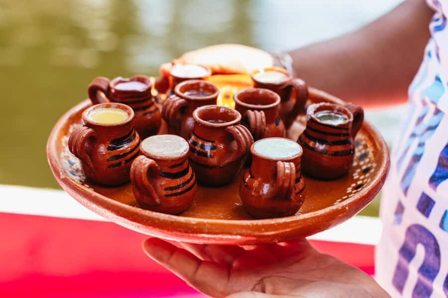 Xochimilco: traditional boat tour, culture, and fun. - Canals, floating islands, and the seasonal flower greenhouses